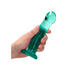 Hand holding a 6.7-inch translucent turquoise non-realistic dildo with a suction cup base.