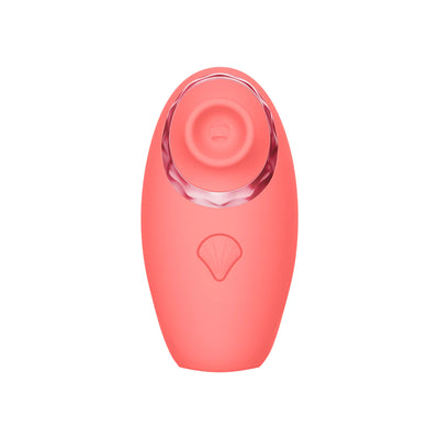 Coral pink Luv Inc Tv11 triple-action clitoral vibrator with silicone body and textured suction head.