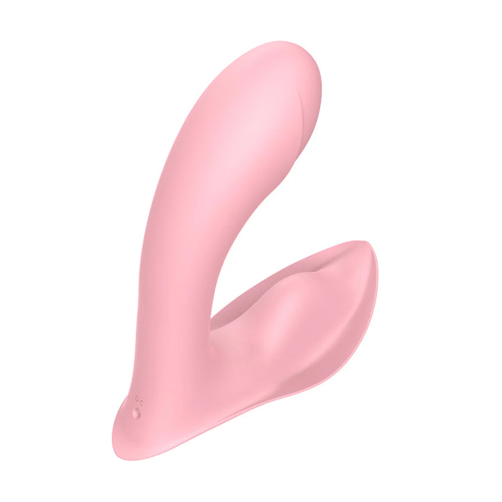 Pink silicone insertable panty vibrator with curved design for targeted stimulation.