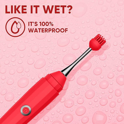 Red waterproof vibrator with flexible tip and power button on pink water droplet background.