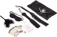 Weekend In Bed Game Kit with play cards, dice, feather tickler, blindfold, paddle, flogger, massage candle, and storage bag.