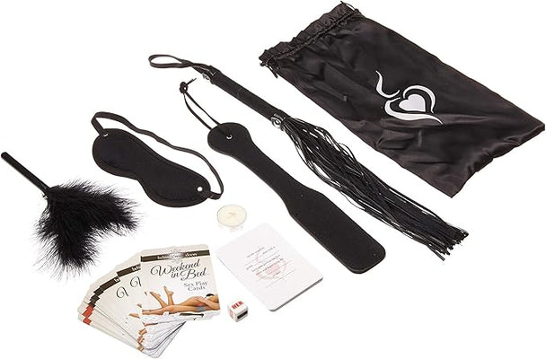 Weekend In Bed Game Kit with play cards, dice, feather tickler, blindfold, paddle, flogger, massage candle, and storage bag.