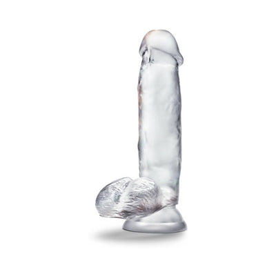Clear 7-inch realistic dildo with textured base and suction cup for hands-free use.