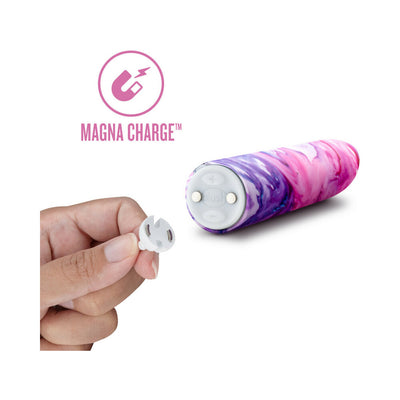 Hand holding magnetic charging connector next to lilac and pink marbled vibrator with Magna Charge logo above.