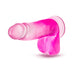 Fuchsia translucent dildo with realistic texture and suction cup base for hands-free use.