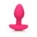 Vibrant pink silicone butt plug with a wide base, smooth surface, and tapered tip for comfortable use.