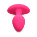 Vibrant pink silicone butt plug with smooth tapered tip and wide base for secure, comfortable wear.