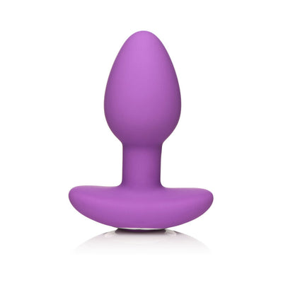 Vibrant violet silicone butt plug with wide base and smooth, tapered design for comfortable use.