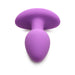 Vibrant violet silicone butt plug with smooth, tapered shape and wide base for secure, comfortable wear.