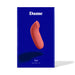 Dame Aer Air Pulse Stimulator in coral pink displayed on blue packaging box with white text.
