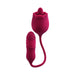 Red dual-action silicone pleasure toy with textured bullet and rose-shaped stimulator connected by flexible cord.
