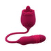 Red dual-action silicone pleasure toy with rose-shaped stimulator and textured vibrating bullet connected by a flexible cord.