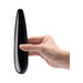 Hand holding a sleek, black obsidian slim wand with a smooth, tapered design against a white background.