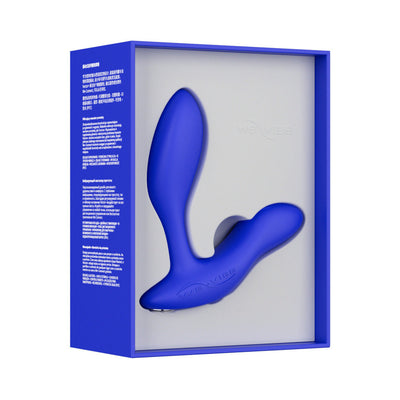 We-Vibe Vector+ prostate massager in blue silicone displayed in branded blue and white packaging.