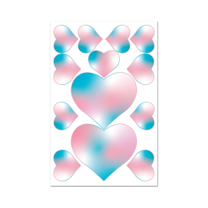 Sheet of pastel pink and blue heart-shaped edible pasties and pecker wraps with a cotton candy color blend.