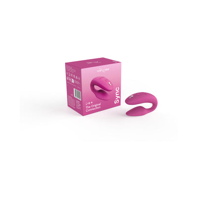 We-Vibe Sync couples vibrator in purple with matching pink packaging box on white background.