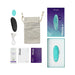 We-Vibe Moxie+ teal wearable vibrator with remote, magnetic clip, USB charger, pouch, lubricant packet, and user guides displayed with packaging box.