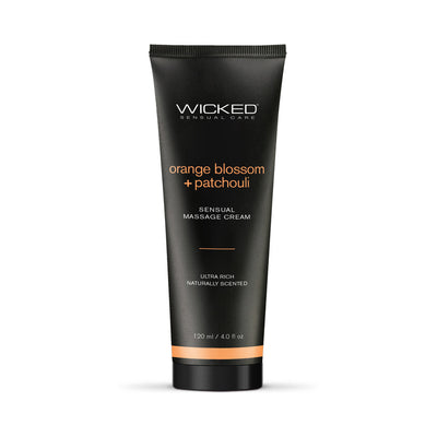 Tube of Wicked Orange Blossom + Patchouli Sensual Massage Cream in black packaging with orange and white text, 4 oz.