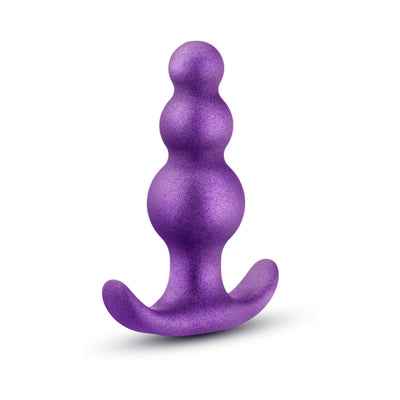 Purple anal plug with graduated bead design and curved flared base for secure, comfortable wear.
