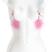 Rose gold adjustable nipple clamps with soft silicone tips and pink feather accents on a white mannequin torso.