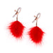 Rose gold adjustable nipple clamps with soft silicone tips and vibrant red feather accents