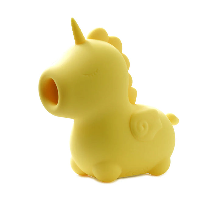 Yellow silicone unicorn-shaped flicking vibrator with a rounded tongue and small wings detail.