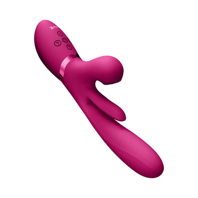 Magenta rechargeable silicone vibrator with ergonomic design, dual stimulation arms, and control buttons on handle.