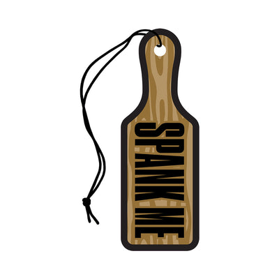 Wood paddle-shaped air freshener with "SPANK ME" text and hanging string, sandalwood scent design.