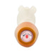 Top view of You2toys Glow-in-the-dark Rabbit Vibrator showing white silicone body and orange base with a decorative pink button.