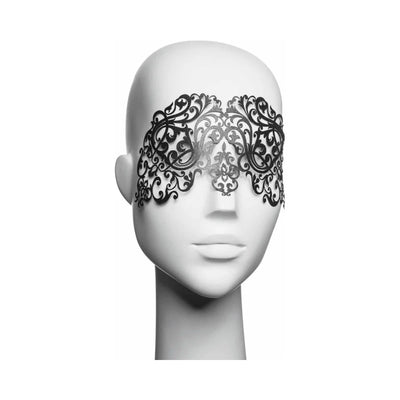 Black ornate decal eyemask with intricate scrollwork displayed on a white mannequin head