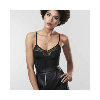 Model wearing Bijoux Indiscrets silver chain necklace whip styled with black lace camisole and leather pants.