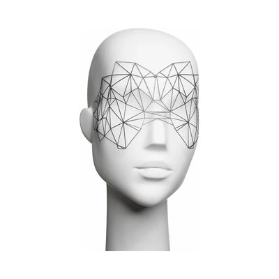 Geometric black decal eyemask displayed on white mannequin head, delicate and modern design for face adornment.