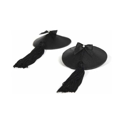 Black leather and satin burlesque pasties with tassels and small decorative bows with pearl accents.