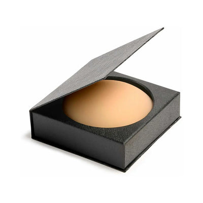 Caramel-colored reusable silicone nipple covers in a sleek black storage case with a textured lid.