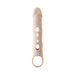Beige silicone penis extender sleeve with multiple peek-a-boo holes and a ring at the base for added stimulation.