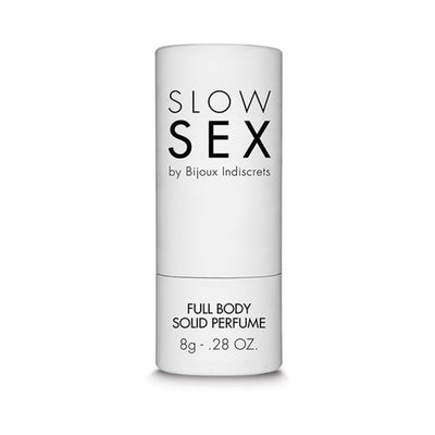 Bijoux Indiscrets Slow Sex Full Body Solid Perfume in a sleek white stick container with black text, 0.28 oz size.