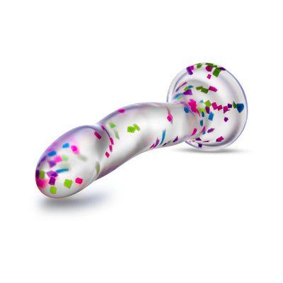 Clear silicone dildo with colorful confetti inside and a sturdy suction cup base for hands-free use.