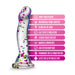 Clear silicone dildo with colorful confetti, curved shape, and suction cup base, highlighting key features in pink text bars.