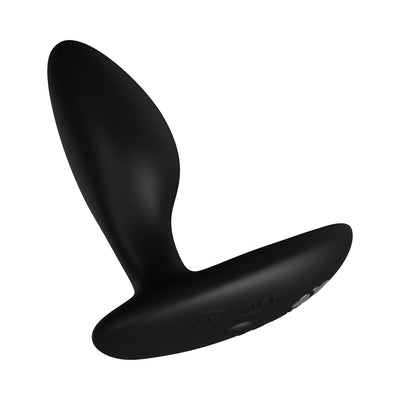 Black silicone We-Vibe Ditto+ vibrating anal plug with curved shape and flat base with control buttons.