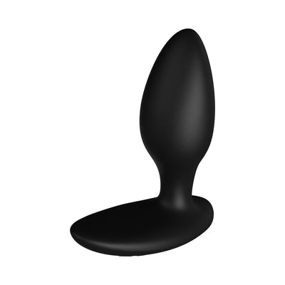 Black silicone We-Vibe Ditto+ vibrating anal plug with smooth, curved design and wide base.