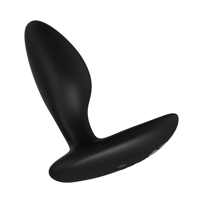 Black silicone We-Vibe Ditto+ remote-controlled vibrating anal plug with ergonomic curved design and smooth finish.