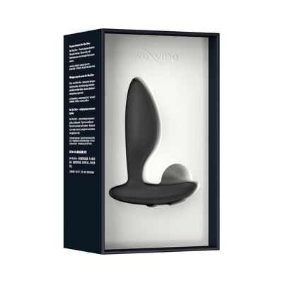 We-Vibe Ditto+ sleek black silicone vibrating anal plug displayed in premium black and white packaging.