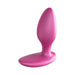 Pink silicone We-Vibe Ditto+ rechargeable vibrating anal plug with curved base on white background.