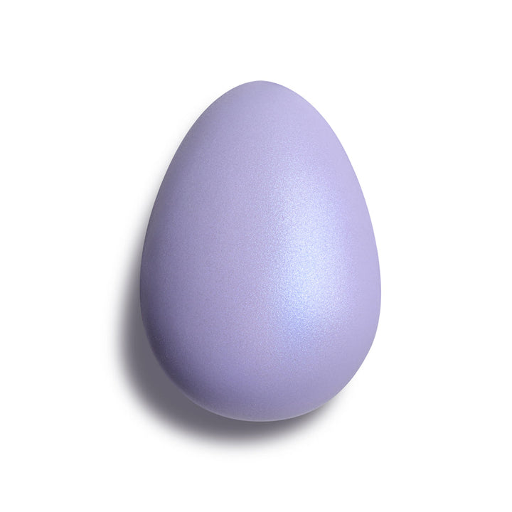 Iridescent lavender egg-shaped silicone massager with smooth satin finish on white background.