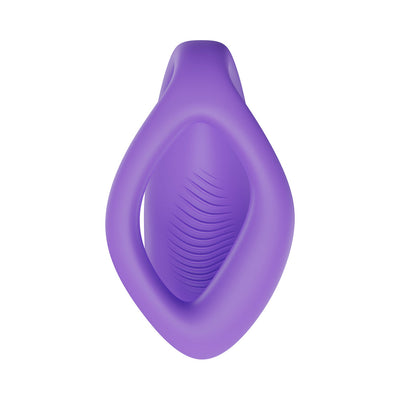 Purple silicone We-Vibe Sync O couples vibrator with flexible O-shaped design and textured inner surface.