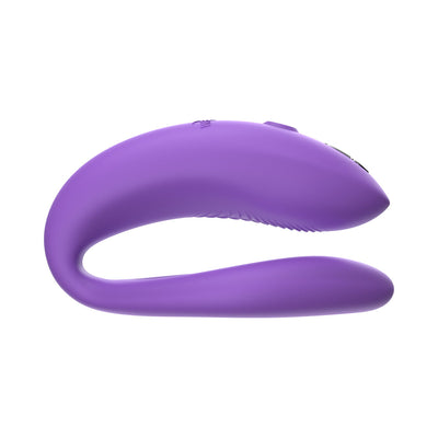 Purple flexible We-Vibe Sync O couples vibrator with smooth silicone finish and ergonomic curved design.