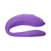 Purple flexible We-Vibe Sync O couples vibrator with smooth silicone finish and ergonomic curved design.