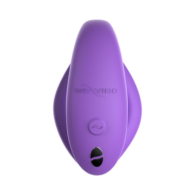 Purple We-Vibe Sync O couples vibrator with smooth silicone surface and control buttons visible on top.