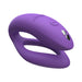Purple We-Vibe Sync O couples vibrator with smooth silicone finish and dual control buttons.
