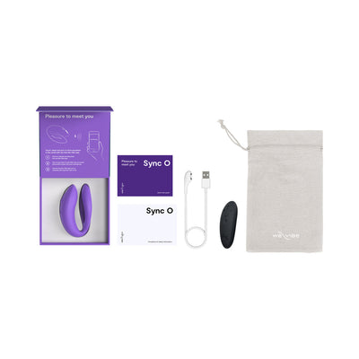 We-Vibe Sync O couples vibrator in purple with packaging, remote control, USB charging cable, user guides, and storage pouch.